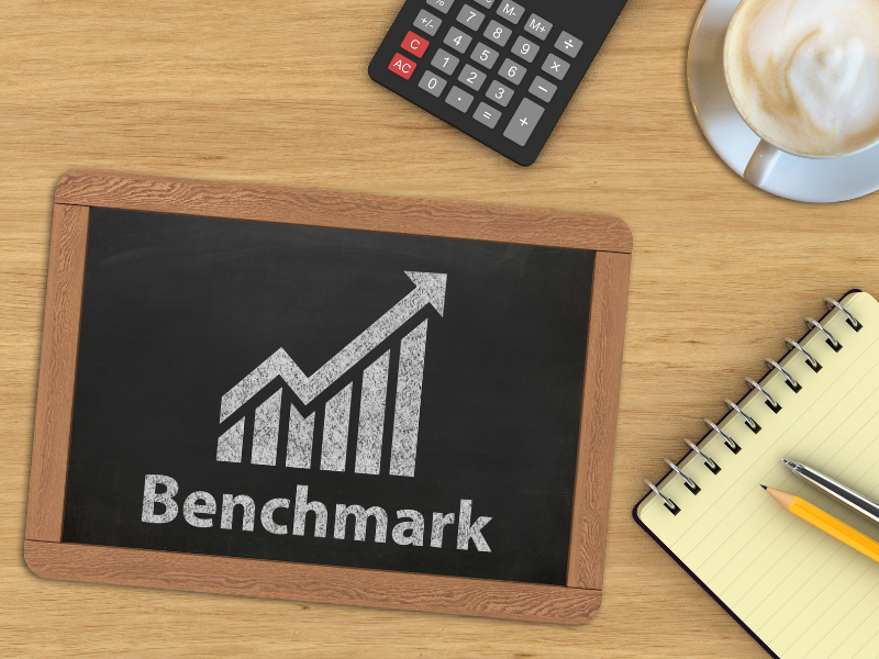 What is a benchmarking report and how can it help my business?